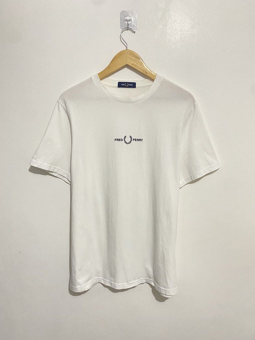 Fred Perry Script White Tee (Category: Tshirts & Polo Shirts ) located in Batangas. Submitted by got.thrift (Listing ID 1470575824, Image 1). Description: W-22 L-29 Like New No Issue.