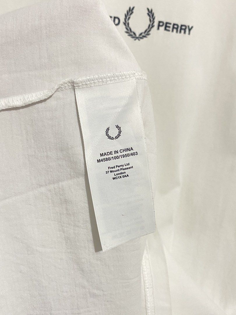 Fred Perry Script White Tee (Category: Tshirts & Polo Shirts ) located in Batangas. Submitted by got.thrift (Listing ID 1470575824, Image 3). Description: W-22 L-29 Like New No Issue.