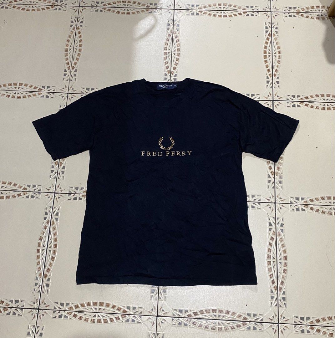 Fred Perry shirt(womens) (Category: Shirts) located in Cebu City. Submitted by hustler_69 (Listing ID 1470664941, Image 1). Description: Fred Perry shirt(womens) Size 12 18 width 24 length Excellent condition Details are all posted.