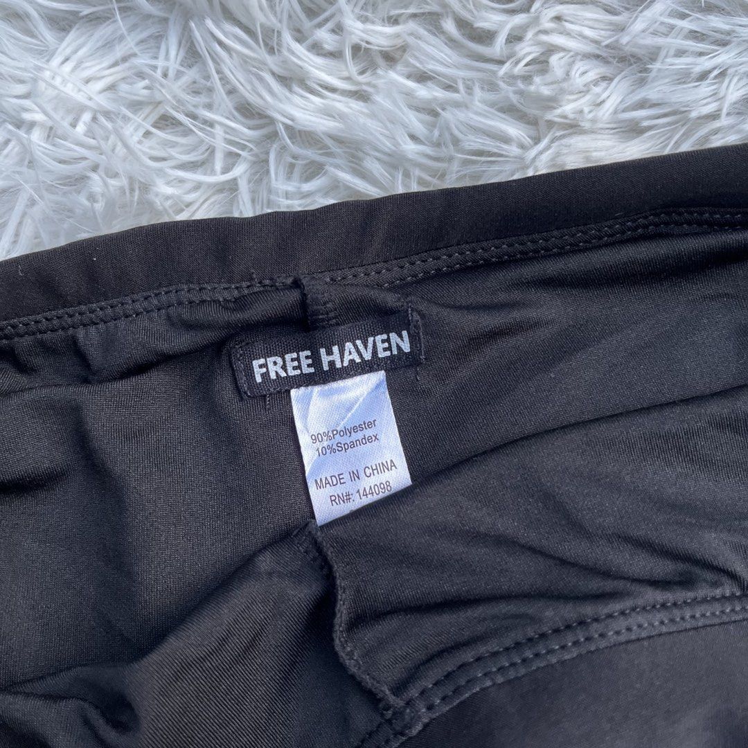 Free Haven Black Active Skort (Category: Activewear) located in Cuyapo. Submitted by Ashtyn.Pre.Loved (Listing ID 1470738951, Image 2). Description: - Brand: Free Haven - Color: Classic Black - Material: Stretchy polyester and spandex blend - Features: Built-in shorts underneath for secure coverage and freedom of movement - Versatile Use: Great for tennis, workouts, gym sessions, or casual daily wear - Easy Styling: Simple solid design that match