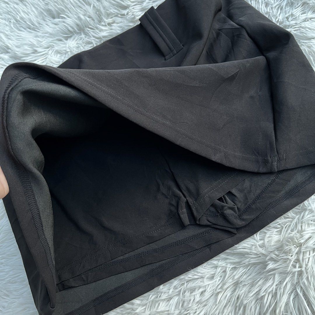 Free Haven Black Active Skort (Category: Activewear) located in Cuyapo. Submitted by Ashtyn.Pre.Loved (Listing ID 1470738951, Image 3). Description: - Brand: Free Haven - Color: Classic Black - Material: Stretchy polyester and spandex blend - Features: Built-in shorts underneath for secure coverage and freedom of movement - Versatile Use: Great for tennis, workouts, gym sessions, or casual daily wear - Easy Styling: Simple solid design that match