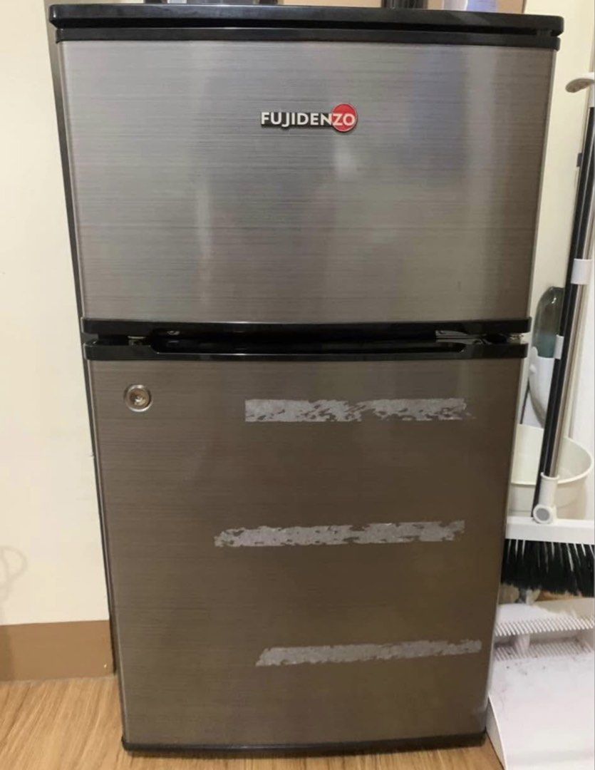 Fujidenzo Two-Door Refrigerator (Category: Refrigerators and Freezers) located in Makati City. Submitted by koleksyonnikt (Listing ID 1470683251, Image 1). Description: - Brand/Model: Fujidenzo Two-Door Mini Fridge - Color: Sleek Gray - Condition: Runs great and keeps items cold; l - Features: Compact size ideal for dorms, offices, and small spaces, plus a built-in lock on the lower door for added security - Fulfillment: Pick up only 3.5 cu.ft Di