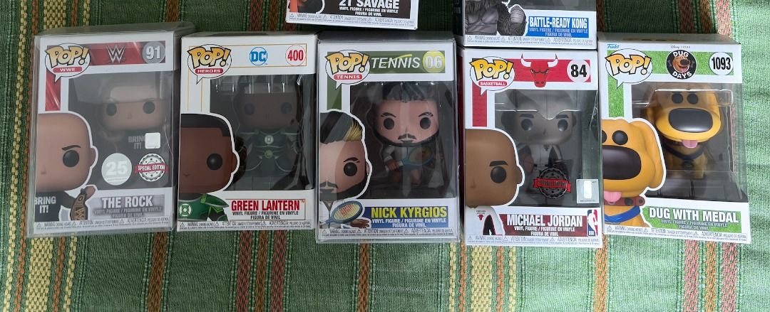 Funko Pop Collection (Category: Figurines & Statues) located in Taguig. Submitted by noblephoenix_e3fda3 (Listing ID 1470670076, Image 1). Description: - Funko Pop collectibles for sale (single or batch) - Available items: The Rock WWE #91, Green Lantern DC #400, Nick Kyrgios Tennis #06, Michael Jordan Bulls #84, Dug with Medal #1093 - Condition: All boxes in protective cases or standard packaging - Message for individual availability or grab the