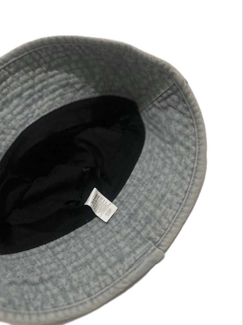Ganni Denim Bucket Hat Grey (Category: Hats & Beanies) located in Tacloban City. Submitted by thrftg (Listing ID 1470651508, Image 2). Description: - Brand: Ganni - Style: Denim bucket hat - Color: Washed grey with contrasting white logo patch - Interior: Black fabric lining with official branded care tag - Perfect for: Casual everyday wear and streetwear styling - SF via J&T or GogoExpress / Same-day delivery available within Metro Manila.