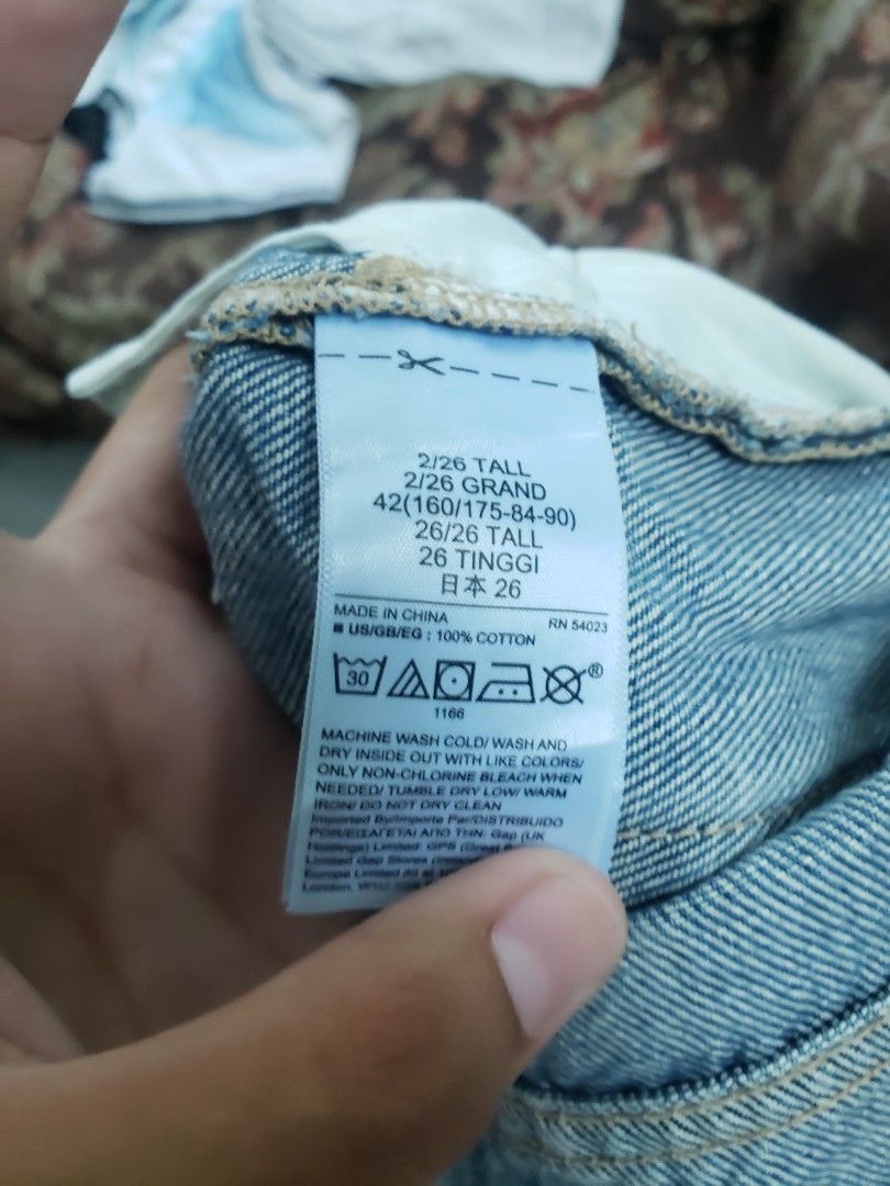 Gap Cheeky Straight Denim Shorts Medium Destroy Size 26 (Category: Shorts) located in Pagsanghan. Submitted by yuchinz (Listing ID 1470661345, Image 3). Description: - Brand/Style: Gap cheeky straight denim shorts - Wash: Medium destroy wash in solid blue - Size: 26 tall - Material: 100% cotton - Features: Classic button fly closure, raw frayed hem, and distressed details throughout - Care: Machine washable - Condition/Fit: Great casual staple pi