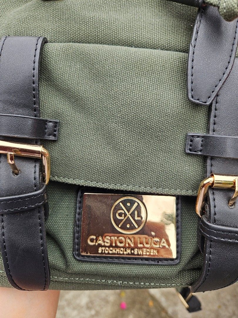 Gaston Luga Backpack Authentic from Sweden (Category: Backpacks) located in Iloilo. Submitted by floresse (Listing ID 1470667317, Image 1). Description: Authentic Gaston Luga rucksack in a classic olive green heavy-duty canvas with black vegan leather straps and brass-tone hardware. Great minimalist everyday carry, work bag, or travel backpack. ​📍 Location: Iloilo City ​📦 Nationwide shipping available via J&T / LBC (free shipping) ​💳 Payment v
