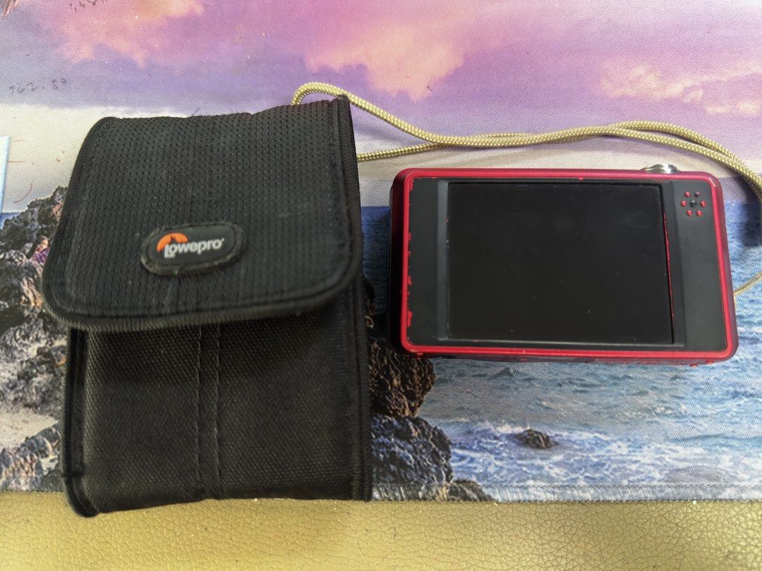 GE E1486 TW 14.1MP Digital Camera Red (Category: Cameras) located in Marikina City. Submitted by patriciaoriendo2 (Listing ID 1470571080, Image 2). Description: - Model: Red GE E1486 TW Digital Camera - Resolution: 14.1 Megapixels with 8x optical zoom - Condition: Fully functional buttons and lens; minor scuffs and wear along body edges from regular use - Storage: Uses standard SD cards - Inclusions: Original wrist strap and a durable black Lowep