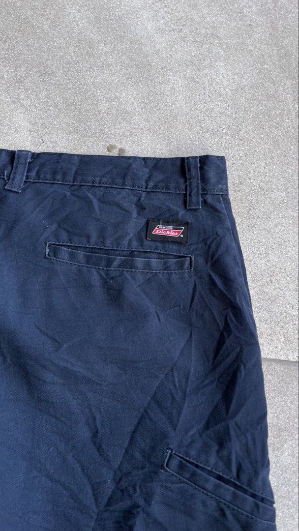 Genuine Dickies Navy Blue Work Shorts (Category: Shorts) located in Cabuyao City. Submitted by bulandos (Listing ID 1470655132, Image 3). Description: Genuine Dickies navy blue utility shorts. Classic workwear style with multi-pocket design including back welt pockets and side tool pocket. Iconic Dickies logo patch above the back right pocket. Button closure with zip fly and belt loops. Durable cotton blend fabric, great for daily casual wear or 