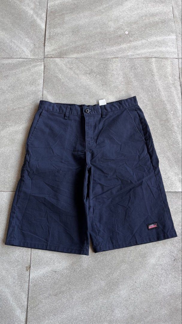 Genuine Dickies Navy Blue Work Shorts Size 32 (Category: Shorts) located in Cabuyao City. Submitted by bulandos (Listing ID 1470655224, Image 2). Description: - Brand: Genuine Dickies - Color: Navy Blue - Size: 32 - Material: 65% Polyester, 35% Cotton blend for durability and comfort - Fit: Classic fit - Details: Back welt pockets and woven logo patch above the right rear pocket - Origin: Made in Honduras.