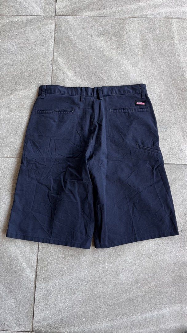 Genuine Dickies Navy Blue Work Shorts Size 32 (Category: Shorts) located in Cabuyao City. Submitted by bulandos (Listing ID 1470655224, Image 1). Description: - Brand: Genuine Dickies - Color: Navy Blue - Size: 32 - Material: 65% Polyester, 35% Cotton blend for durability and comfort - Fit: Classic fit - Details: Back welt pockets and woven logo patch above the right rear pocket - Origin: Made in Honduras.