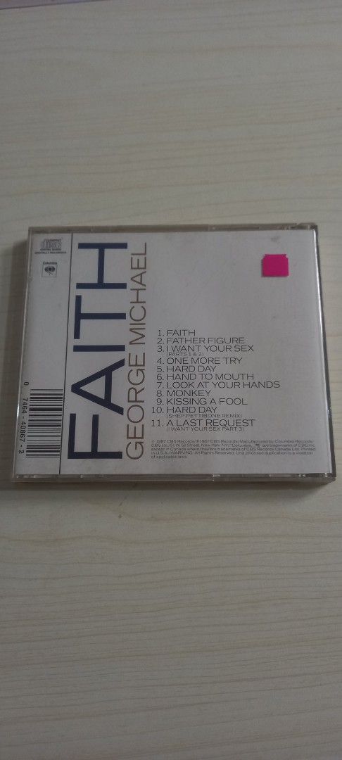 George Michael Faith CD Album (Category: CDs & DVDs) located in Pasig City. Submitted by j-fri0127 (Listing ID 1470579906, Image 2). Description: - Artist & Album: George Michael - Faith - Label: Columbia Records - Format: Audio CD with jewel case, original booklet, and rear insert - Condition: Disc surface is clean and plays properly - Key Tracks: Faith, Father Figure, I Want Your Sex, Monkey, Kissing a Fool - Genre: Classic 80s pop.