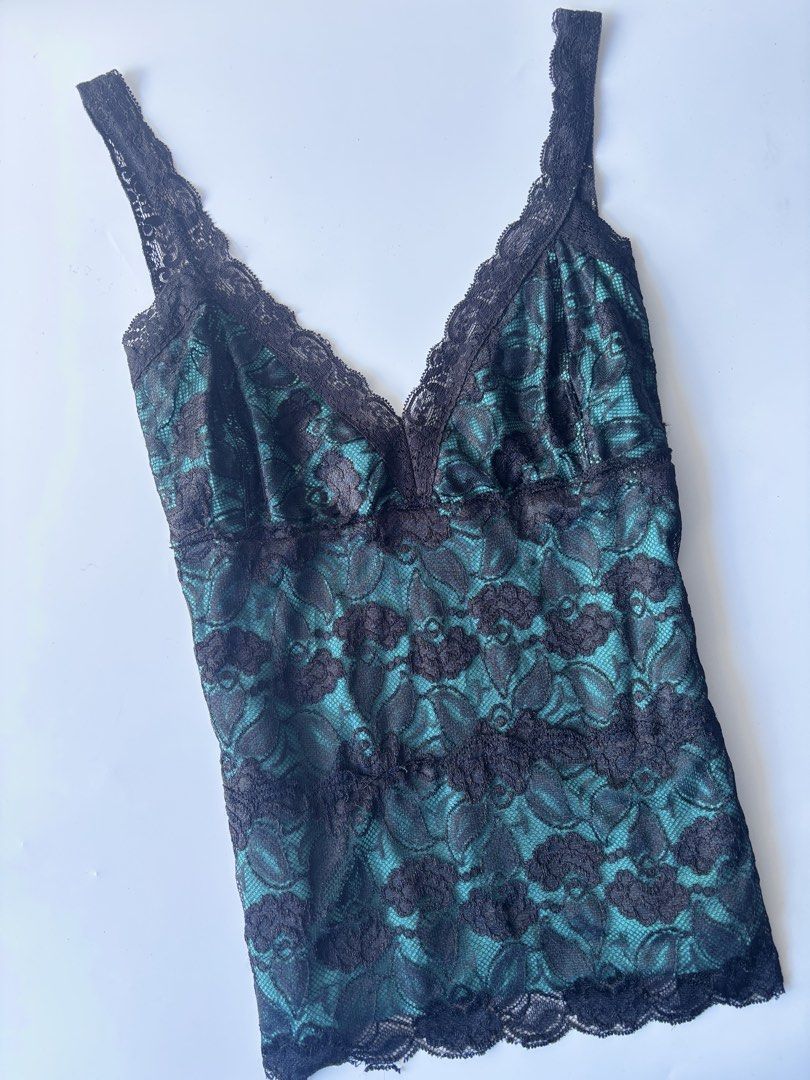 George Stretch Teal Lace Cami Top (Category: Sleeveless) located in Batac City. Submitted by doniagel (Listing ID 1470634085, Image 2). Description: - Brand: George - Size: M to L (12/14) - Color: Teal and black - Material: Lace overlay (95% nylon, 5% spandex) with inner cotton-spandex layer - Design: V-neckline with scalloped lace trim - Origin: Made in Guatemala - Versatility: Great layering piece or standalone going-out top.