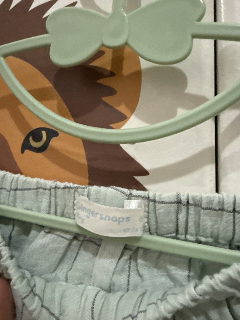 Gingersnaps Mint Green Checked Ruffle Baby Shorts (Category: Babies & Kids Fashion) located in Paranaque City. Submitted by aneevesereth (Listing ID 1470644352, Image 2). Description: - Brand: Gingersnaps - Color/Pattern: Mint green with checkered design - Features: Layered ruffles on both sides, elastic waistband with front tie detail - Material: Soft and comfy fabric ideal for little ones - Condition/Use: Great everyday wear piece.