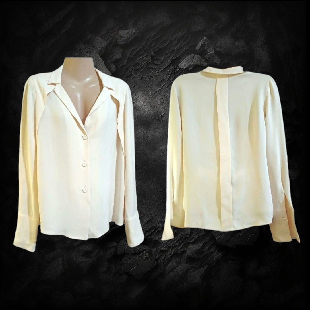 Giorgio Armani Long Sleeve Button Down Blouse (Category: Longsleeves) located in Paranaque City. Submitted by calm_youngstore7 (Listing ID 1470691626, Image 2). Description: - Brand: Giorgio Armani - Item: Cream Silk Blouse - Condition: Brand new with tags attached - Size: Medium - Design: Long sleeves with wide cuffs, front button closure, notched collar, and pleated back detail - Measurements: 15 inches shoulder, 18 inches pit-to-pit, 23 inches