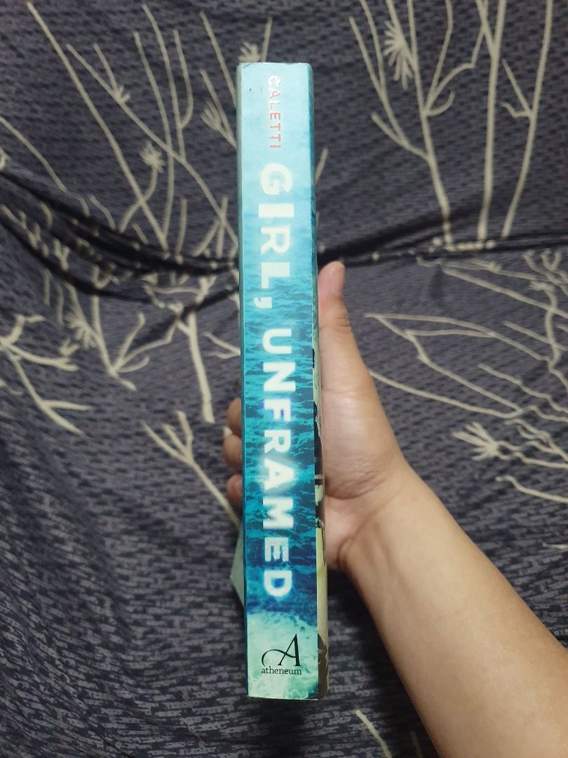 Girl, Unframed by Deb Caletti (Category: Storybooks) located in Bulacan. Submitted by anthony_b01 (Listing ID 1470617679, Image 2). Description: - Girl, Unframed by Deb Caletti - Paperback - 50 pesos only Rfs: Decluttering space Location: SJDM, Bulacan Courier: Lalamove or J&T delivery.