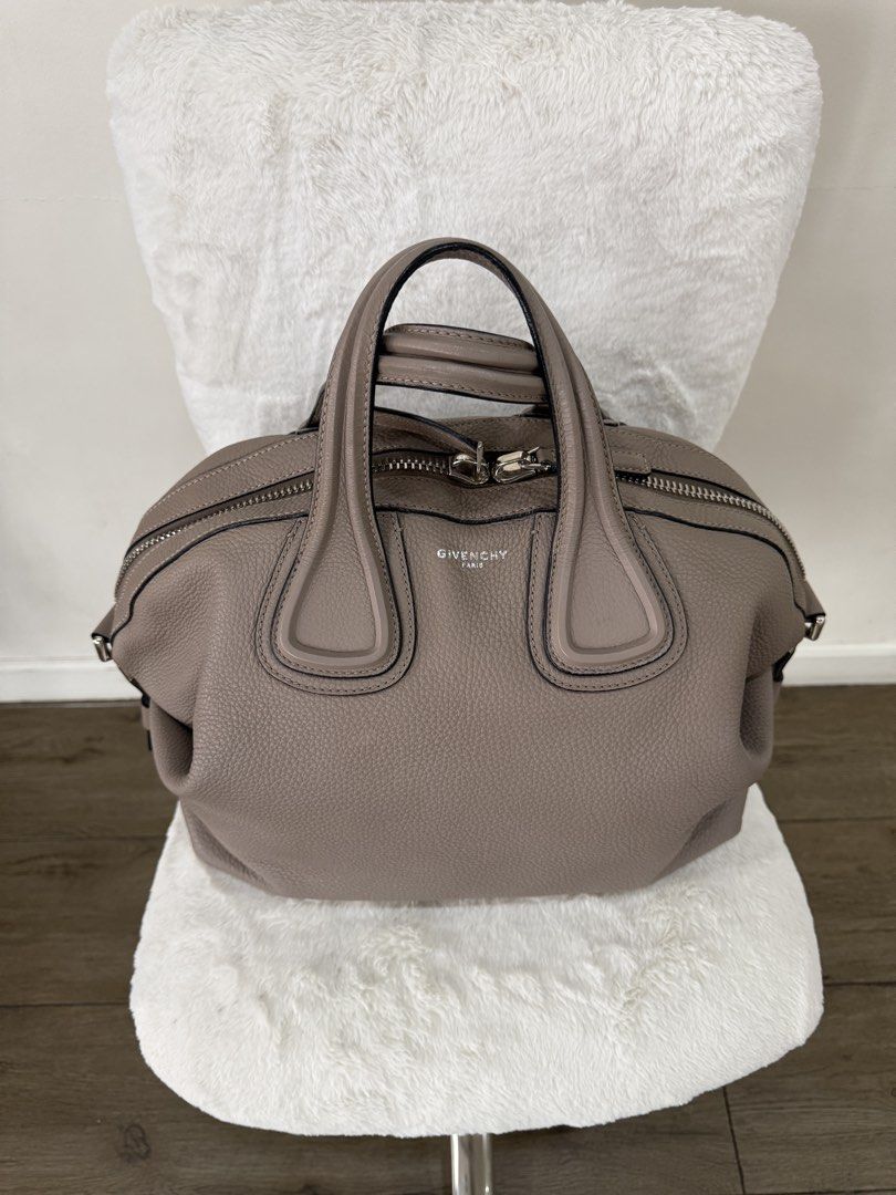 Givenchy Nightingale Large in Mastic (Category: Luxury Bags & Wallets) located in Quezon City. Submitted by closet24 (Listing ID 1470584071, Image 1). Description: - Brand: Givenchy - Material: Mastic pebbled leather - Hardware: Silver-tone with subtle front logo - Closure: Zip top - Handles: Dual rolled top handles - Features: Structured slouchy silhouette with side strap details - Condition: Very well-maintained, clean interior and exterior - V