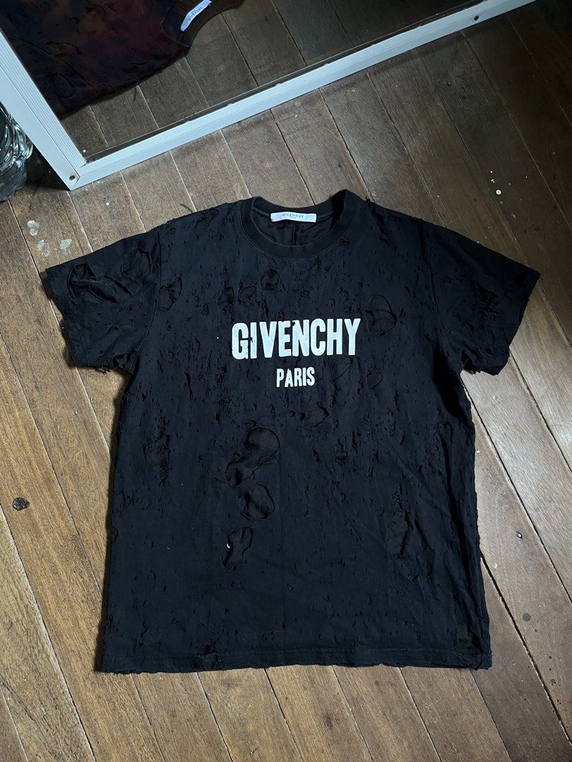 GIVENCHY PARIS DESTROYED DISTRESSED TEE (Category: Luxury Apparel) located in Bugallon. Submitted by thriftteas.00 (Listing ID 1470558008, Image 1). Description: GIVENCHY PARIS DESTROYED DISTRESSED TEE XXS ON TAG FITS LARGE NO ISSUE COMPLETE TAGS NEEDWASH DISTRESSED DESIGN AUTHENTIC/LEGIT CLAIM 4500.