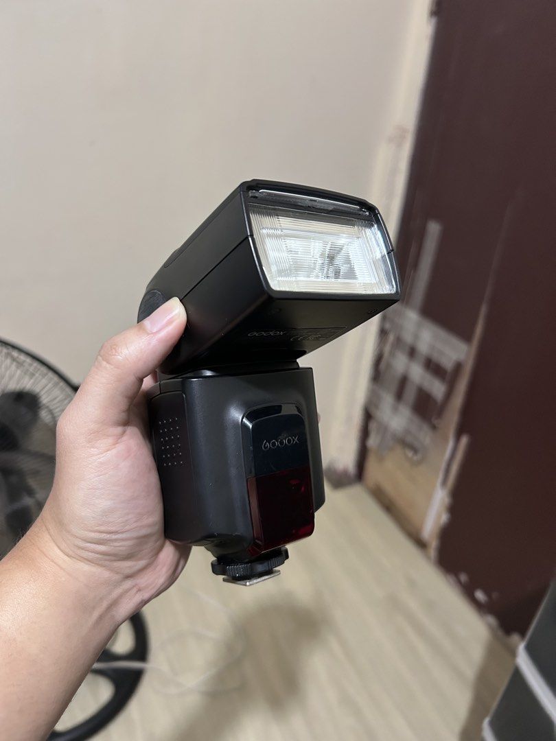 Godox Camera Speedlite Flash (Category: Flashes) located in Manila. Submitted by franciskok29983 (Listing ID 1470565309, Image 1). Description: - Brand: Godox/TT520 II - Color: Black housing - Mount: Standard hot shoe mount with standard pin configuration - Condition: Fully functional and tested - Features: Front flash head and red panel - Compatibility: Works with standard camera hot shoe setups RFS: Di na nagagamit Meetup: South cembo or BGC.