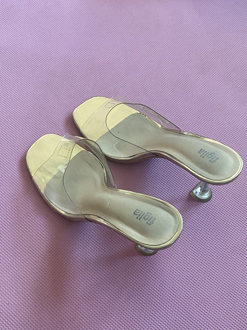 Gold Clear Heels (Category: Heels) located in Legazpi City. Submitted by clutterbusterph (Listing ID 1470595415, Image 2). Description: Figlia Eve Gold Gloria Clear Heels original price - 1500 negotiable price ! -Size 39 -Used with care -see all pics for minimal flaws -all flaws are very minimal and not noticeable at all when worn .