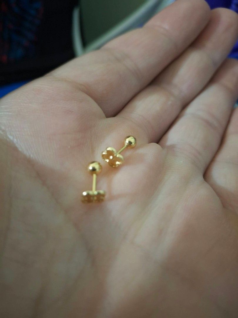 Gold stud earrings with ball backs (Category: Earrings) located in Pasig City. Submitted by franzean (Listing ID 1470603340, Image 2). Description: - Design: Tiny clover or flower shape - Closure: Secure screw-on ball backs (won't poke during sleep or sports) - Style: Dainty, minimalist, and goes with everything - Perfect for: Everyday wear - Condition: Brand new/Mint 18k saudi gold 1.09g.