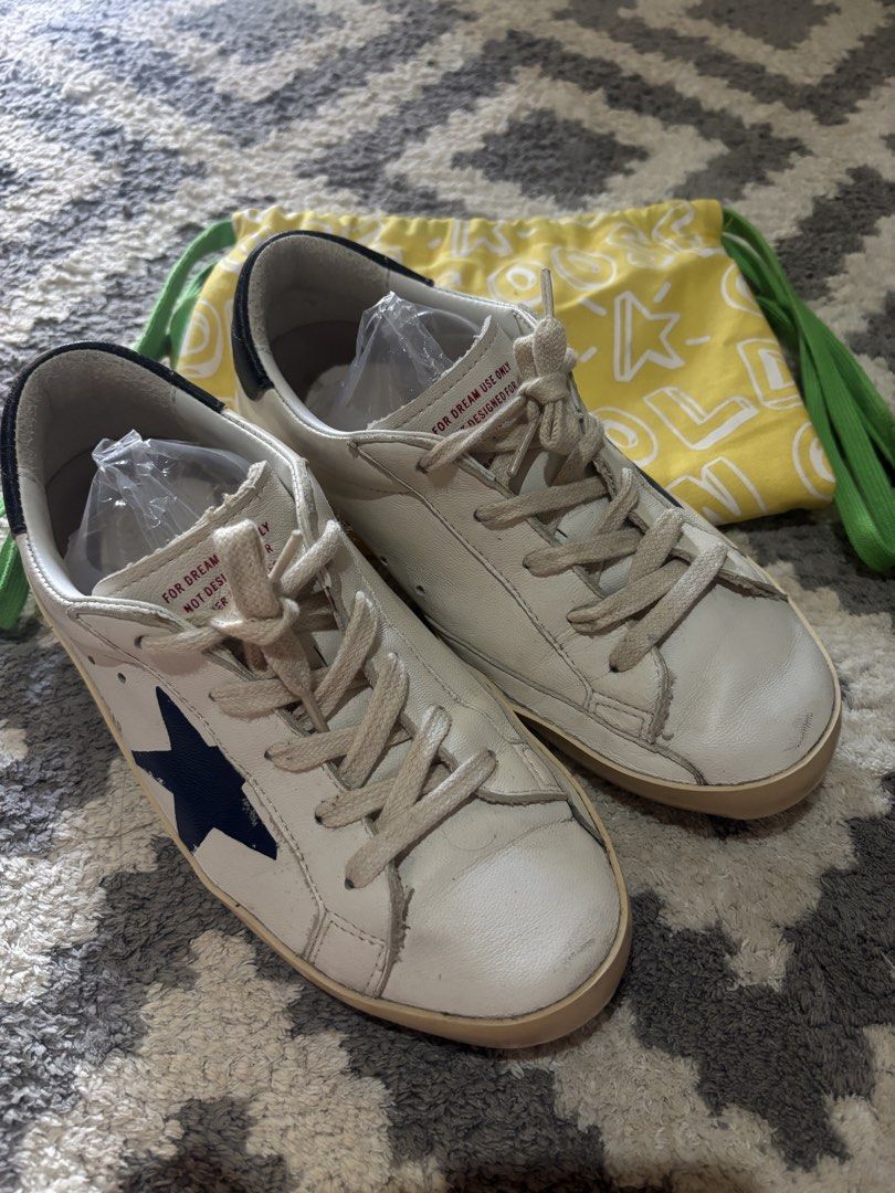 Golden Goose Kids (Category: Sneakers) located in Calauan. Submitted by kristinkarenpelayomedel7212 (Listing ID 1470578797, Image 3). Description: Pre-loved Golden Goose Superstar Young Size 34 No box & passport included With dustbag Slightly negotiable.