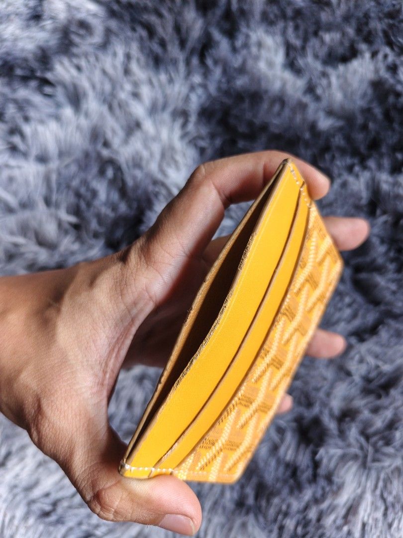 Goyard Saint-Sulpice Card Wallet Yellow (Category: Luxury Bags & Wallets) located in Iloilo. Submitted by emanjoshuaduremdes (Listing ID 1470684224, Image 3). Description: Goyard Saint-Sulpice Card Holder 'Yellow' Type: Card holder Dimensions: 3.5 in (W) x 2.5 in (H) Card slots: 4 Condition: 8/10, light stuffs Authenticity: Not verified, sold as is PHP 225 EJ Thrifted Goods "Thrifted goods for less".