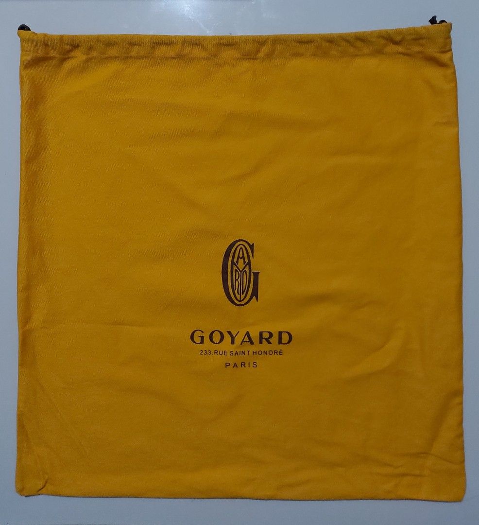 Goyard Yellow Dust Bag (Category: Everything Else Others) located in Lapu Lapu. Submitted by agnesapm_29813 (Listing ID 1470678222, Image 2). Description: - Features the classic Goyard Paris logo on the front - Secure drawstring closure - Measurements: width-18 inches, height-19 inches - Clean fabric with clear branding - Ideal as a replacement dust bag or luxury storage option.