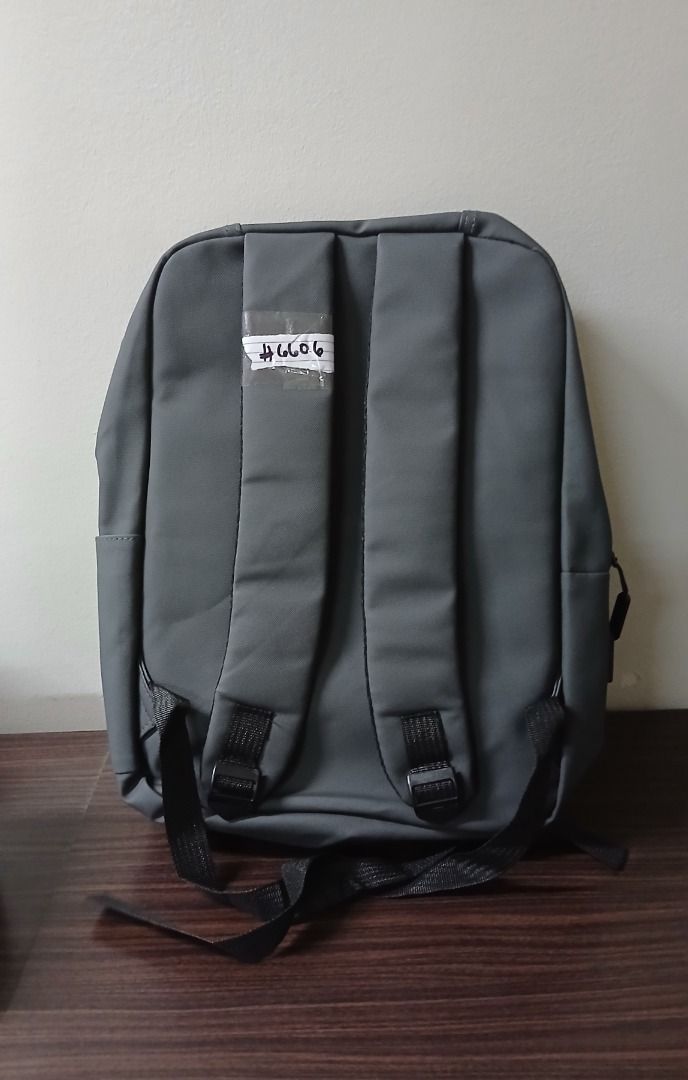 Gray Backpack Simple Casual Bag with Mini Pouch Bag (Category: Backpacks) located in Manila. Submitted by townlites (Listing ID 1470567212, Image 3). Description: Color: Gray Size: 40 x 10 x 29 cm Closure type: zipper With mini pouch bag With USB hole design Fashion bag Backpack style Brand new Quality product.