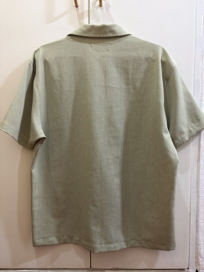 Green Embroidered Short Sleeve Button down (Category: Shirts) located in Quezon City. Submitted by blistceleb (Listing ID 1470711911, Image 2). Description: 26 x 21 Like new No issues .