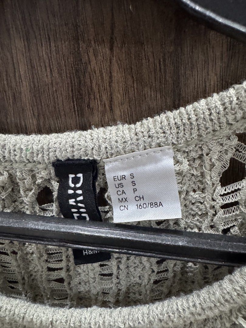 Green knitted top (Category: Sleeveless) located in Pasig City. Submitted by kodak.blue (Listing ID 1470695418, Image 2). Description: .