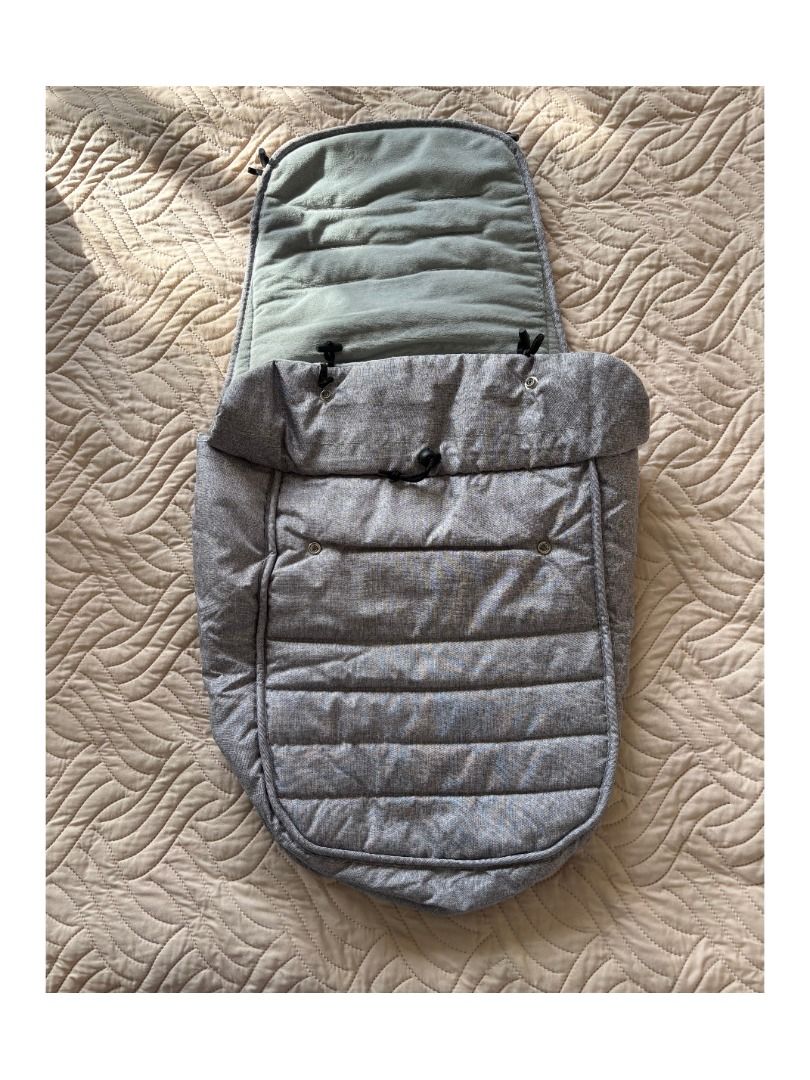 Grey Stroller Winter Footmuff | BML Vault (Category: Strollers) located in Cebu City. Submitted by bml_vault (Listing ID 1470580789, Image 3). Description: - Color: Grey - Keeps baby warm and cozy during cold weather walks - Stylish quilted exterior with a soft fleece interior lining - Convenient zip-down front panel with toggle closure - Universal harness slots built into the back panel for safety - Versatile detachable top section that separate