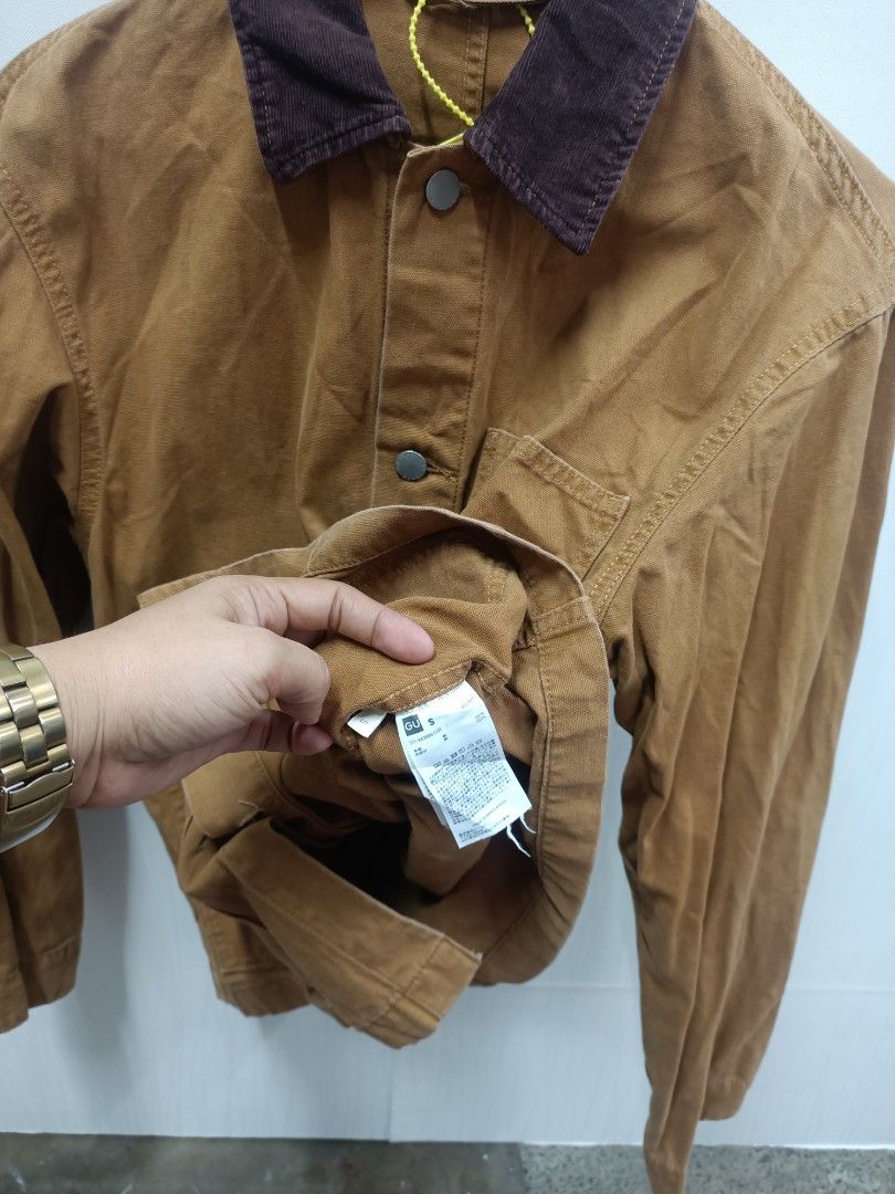 GU brown work jacket with contrast corduroy collar size S (Category: Coats, Jackets and Outerwear) located in Bayombong. Submitted by rheaaa00530 (Listing ID 1470663754, Image 2). Description: - Brand: GU - Item: Brown canvas work jacket - Details: Dark brown corduroy collar, front button closure, multiple patch pockets - Size: S - Condition: Good casual layer for cooler weather - Shipping or meetups available across the Philippines.