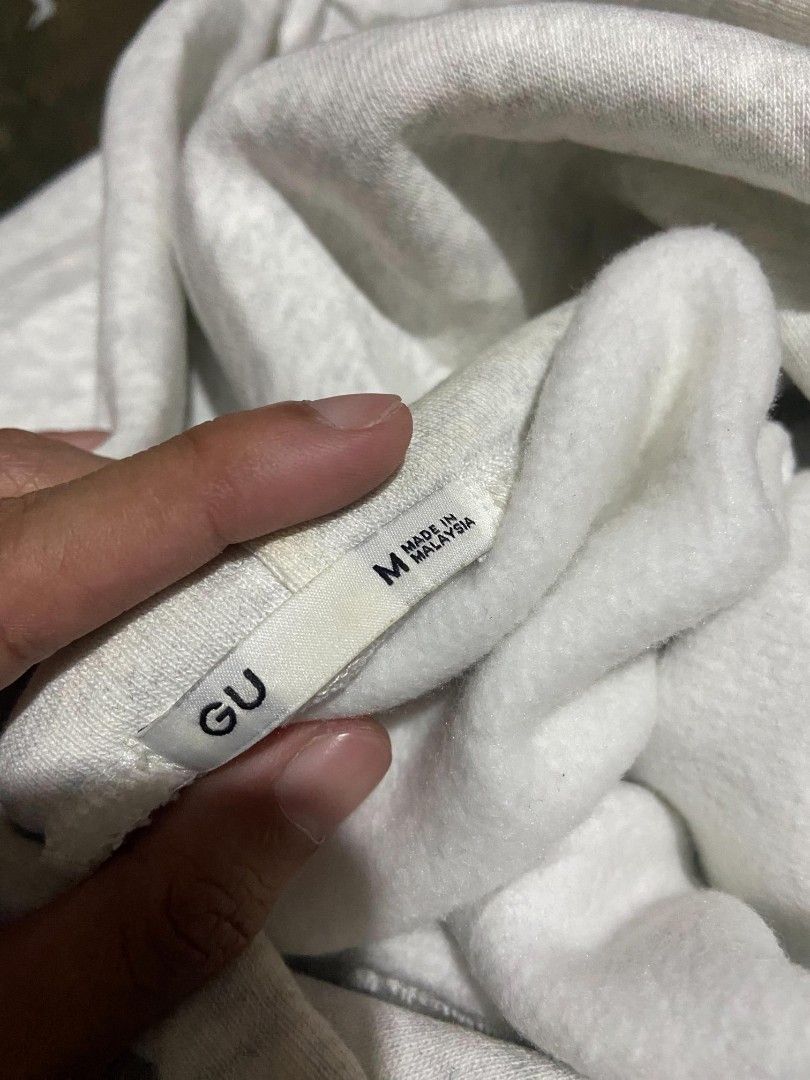 GU heavy weight hoodie (Category: Hoodies) located in Manila. Submitted by justthriftright. (Listing ID 1470648574, Image 3). Description: GU heavy weight hoodie brand new condition 10/10 color rate no issue 27 x 20 best fit medium - large complete tags plus SF.