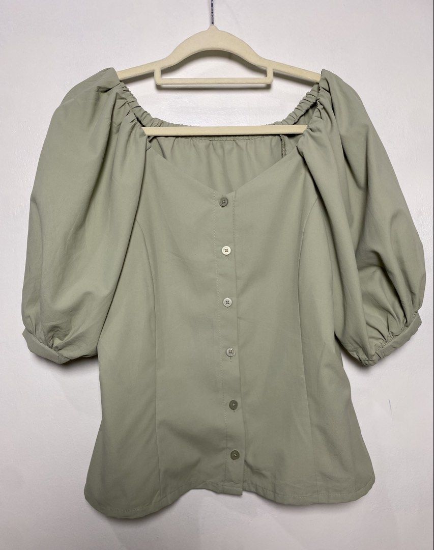 GU Sage green puff sleeve blouse (Category: Blouses) located in Makati City. Submitted by indaysukaycloset (Listing ID 1470683282, Image 1). Description: 🌿 GU SAGE PUFF BLOUSE FOR SALE ITEM: Sage Green Puff Sleeve Blouse BRAND: GU by UNIQLO - Japan Brand COLOR: Sage / Matcha Green - super trendy! STYLE: Square Neck / Puff Sleeve TAG SIZE: M FITS: Medium to large FABRIC: 100% Polyester (ポリエステル) → Flowy, light, soft, no wrinkle, not mainit FEATURE