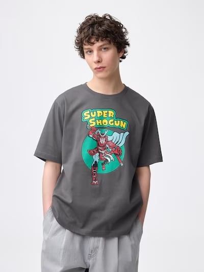 GU Super Shogun Unisex Graphic Tee Grey (Category: Tshirts & Polo Shirts ) located in Rodriguez. Submitted by jo1nna_bagelya (Listing ID 1470678534, Image 3). Description: - Brand: GU, sister brand of Uniqlo - Color: Dark Grey - Design: Super Shogun graphic print with red samurai artwork and yellow lettering - Fit: Relaxed fit with crew neck and short sleeves - Gender: Unisex - Available Sizes: Medium, Large, XL - Price: 415 PHP only BRAND NEW, b