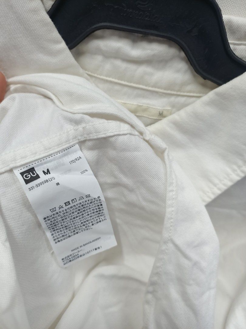 GU White Long Sleeve Button-Down Shirt Size M (Category: Longsleeves) located in Bayombong. Submitted by rheaaa00530 (Listing ID 1470671323, Image 2). Description: - Brand/Item: GU Long Sleeve Shirt - Color: Classic White - Size: Medium (Regular Fit) - Material: 100% Cotton (Made in Bangladesh) - Features: Button-down front, collar, single chest pocket - Condition: Great for everyday casual wear, needs a quick iron before use.