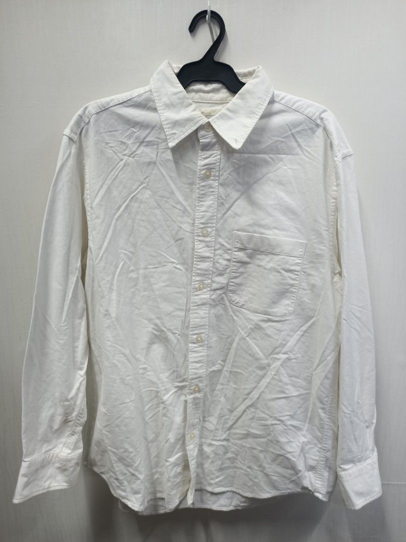GU White Long Sleeve Button-Down Shirt Size M (Category: Longsleeves) located in Bayombong. Submitted by rheaaa00530 (Listing ID 1470671323, Image 1). Description: - Brand/Item: GU Long Sleeve Shirt - Color: Classic White - Size: Medium (Regular Fit) - Material: 100% Cotton (Made in Bangladesh) - Features: Button-down front, collar, single chest pocket - Condition: Great for everyday casual wear, needs a quick iron before use.