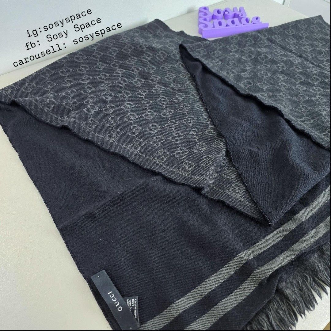 Gucci Black Scarf Wool (Category: Luxury Accessories) located in Lucena. Submitted by sosyspace (Listing ID 1470627231, Image 1). Description: G. U. C. C. I. 05B1P229 Black/Grey Reversible GG Scarf 100% Lana Wool 187 x 35cm Can be worn in winter, spring, fall, or even summer inside your car or when traveling or inside your cool offices or at during your windy beach night parties... not too thick but not to thin. Condition: PRELOVED Pristine condi