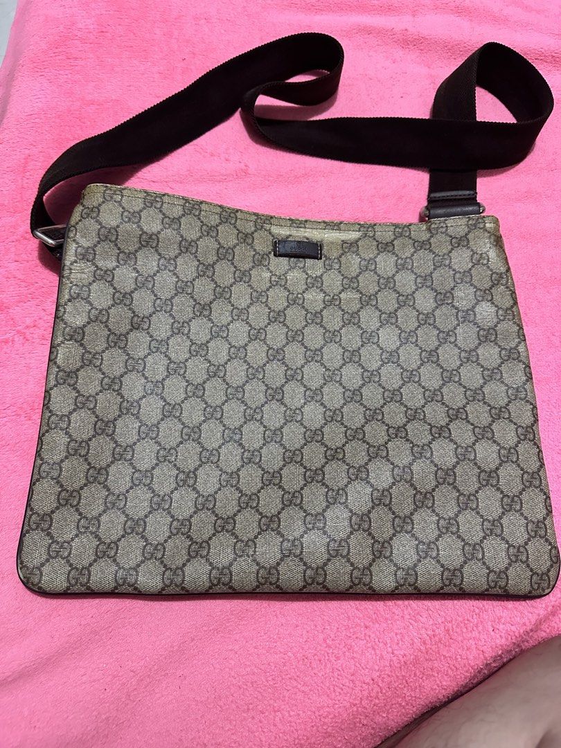 Gucci GG Supreme Messenger Bag (Category: Sling Bags) located in Quezon City. Submitted by pongoy (Listing ID 1470604095, Image 1). Description: - Authentic Gucci messenger bag in classic GG Supreme canvas - Adjustable brown shoulder strap with stylish dark brown leather trim - Secure zip top closure with branded metal pull - Spacious dark fabric interior with a convenient zip pocket for essentials - Premium hardware featuring engraved Gucci lett