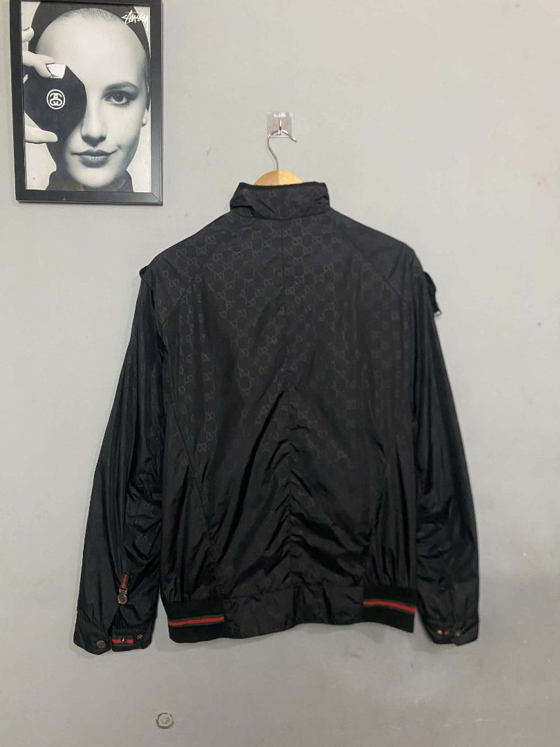 Gucci Monogram Black Nylon Zip-Up Jacket Size 50 (Category: Coats, Jackets and Outerwear) located in Manila. Submitted by arjay_cuayzon2 (Listing ID 1470629888, Image 2). Description: - Brand: Gucci - Item: Black GG Monogram Zip Jacket - Size: 50 (Made in Italy) - Material: Premium nylon with inner lining - Design details: All-over GG monogram, signature green & red striped ribbed hem, high collar, and chest patch emblem - Hardware: Full zip fron