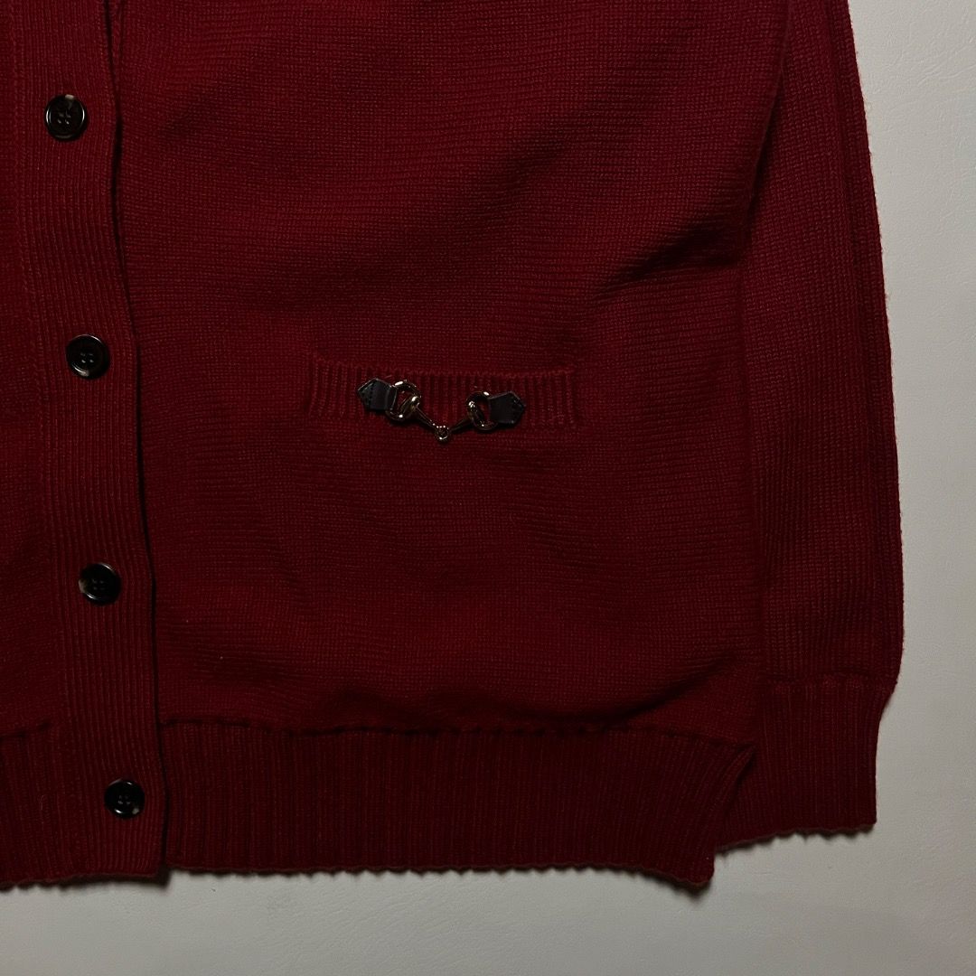 Gucci Wool Cardigan Red Size M (Category: Coats, Jackets and Outerwear) located in Caloocan City. Submitted by achilles_grails (Listing ID 1470593945, Image 3). Description: - Brand: Gucci - Item: Red knit cardigan in wool and cashmere blend - Size: M (170/92Y) - Condition: Brand new with original store tags attached - Design: V-neckline, front button closure with engraved branding, and two front pockets with signature horsebit hardware - Origin: