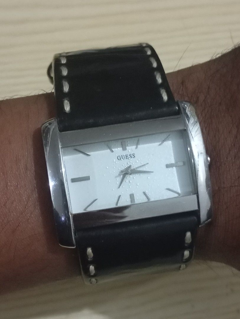 Guess (Category: Men's Watches) located in Las Pinas. Submitted by quick_deals_great_finds2 (Listing ID 1470680031, Image 3). Description: Original good working condition Quartz with battery 45x32mm unisex.