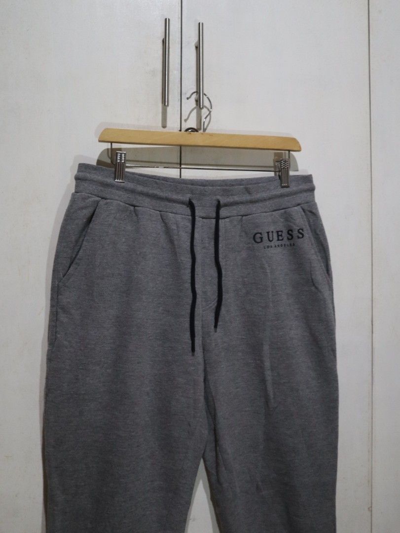 Guess Gray Jogger Pants (Category: Other Bottoms) located in Tarlac. Submitted by gatheredthrift (Listing ID 1470650238, Image 3). Description: size: 28-30 | length: 40 condition: 10/10| no flaws I needs wash mine — 499 + sf 》mod: direct JNT (min. 54) 》📍Tarlac.