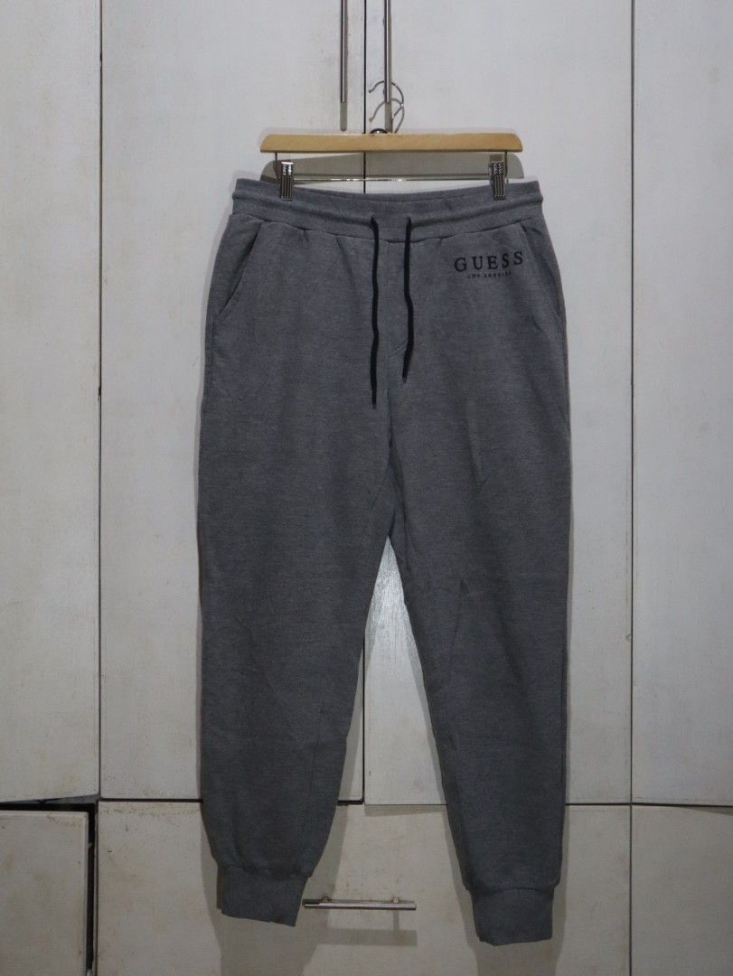 Guess Gray Jogger Pants (Category: Other Bottoms) located in Tarlac. Submitted by gatheredthrift (Listing ID 1470650238, Image 1). Description: size: 28-30 | length: 40 condition: 10/10| no flaws I needs wash mine — 499 + sf 》mod: direct JNT (min. 54) 》📍Tarlac.