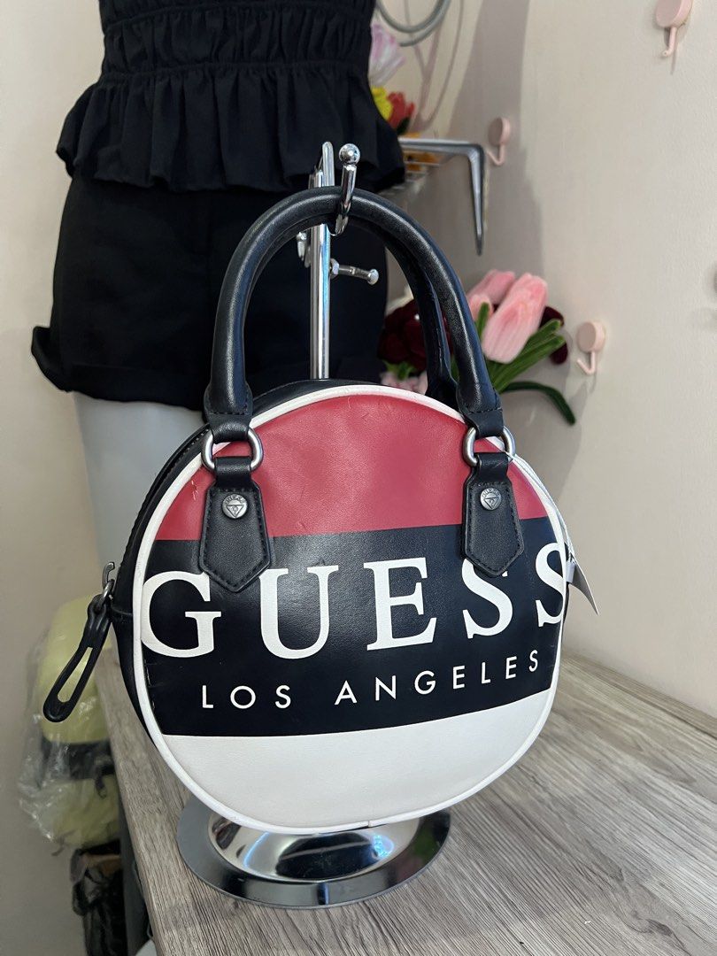 Guess LA - handbag/ sling bag (Category: Cross-body Bags) located in Quezon City. Submitted by handpicked_collections_ph (Listing ID 1470673220, Image 1). Description: .