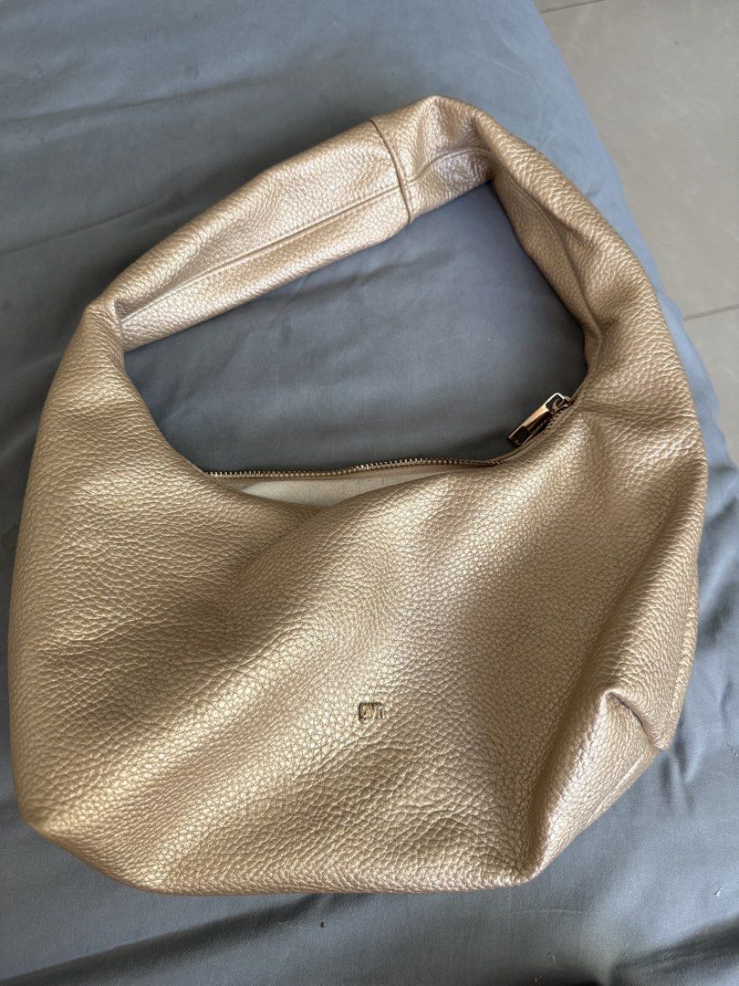 GVN medium hobo bag (heavy pebbled) (Category: Purses & Pouches) located in Quezon City. Submitted by eeezuuhclothes (Listing ID 1470636112, Image 1). Description: - needs cleaning - no scratches - no flaws - RFS: too many bags.