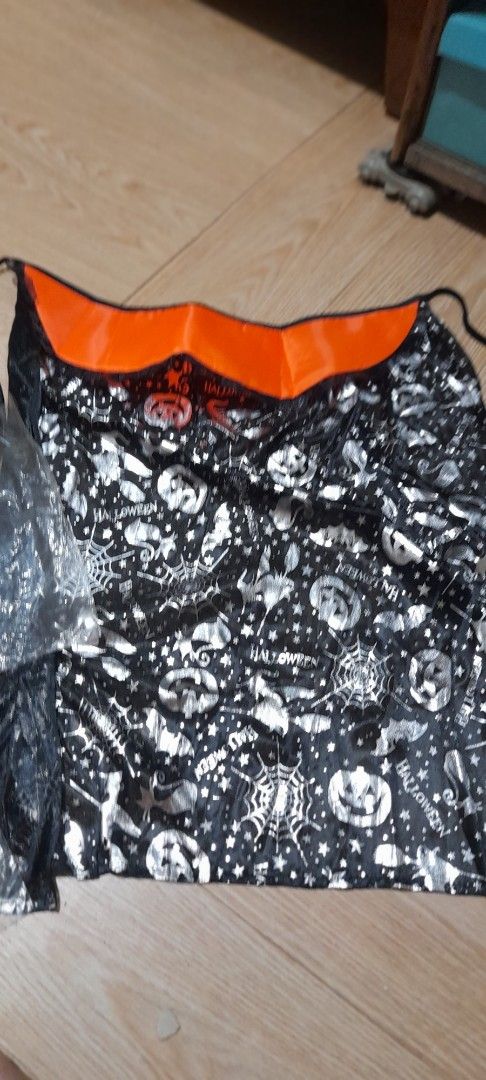Halloween Bundle Set (Category: Occasions & Party Supplies) located in Bocaue. Submitted by marajapansurplus (Listing ID 1470660036, Image 3). Description: - All-in-one Halloween party bundle ready for trick-or-treating or hosting - stylish silver pumpkin and spiderweb prints cape - pack of festive pumpkin napkins paired with golden picks - Handheld jack-o-lantern witch hat wand with a playful, flexible spring metal shaft ( as is condition, untes