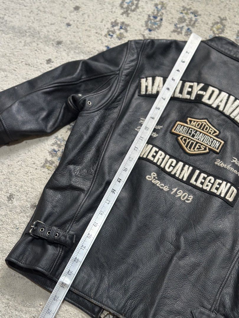 Harley-Davidson American Legend Leather Jacket (Category: Coats, Jackets and Outerwear) located in Daet. Submitted by thrifthings2018 (Listing ID 1470629131, Image 3). Description: - Authentic black Harley-Davidson leather jacket - Heavyweight genuine leather with warm quilted lining - Large embroidered American Legend and Bar & Shield back graphic - Smaller embroidered logo on the left chest - Functional features: zip pockets, zippered cuffs, sn