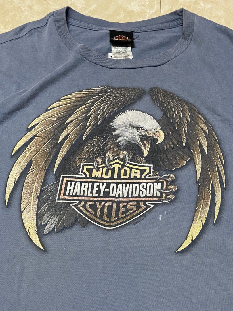 Harley-Davidson Superstition Arizona Devils Highway T-Shirt (Category: Tshirts & Polo Shirts ) located in Binan City. Submitted by doze16 (Listing ID 1470693373, Image 3). Description: - Official 2020 Harley-Davidson merchandise - Color: Muted blue wash - Front design: Bald eagle with Bar & Shield logo - Back design: Devils Highway Route US 666 Superstition Apache Junction, Arizona with map graphics.
