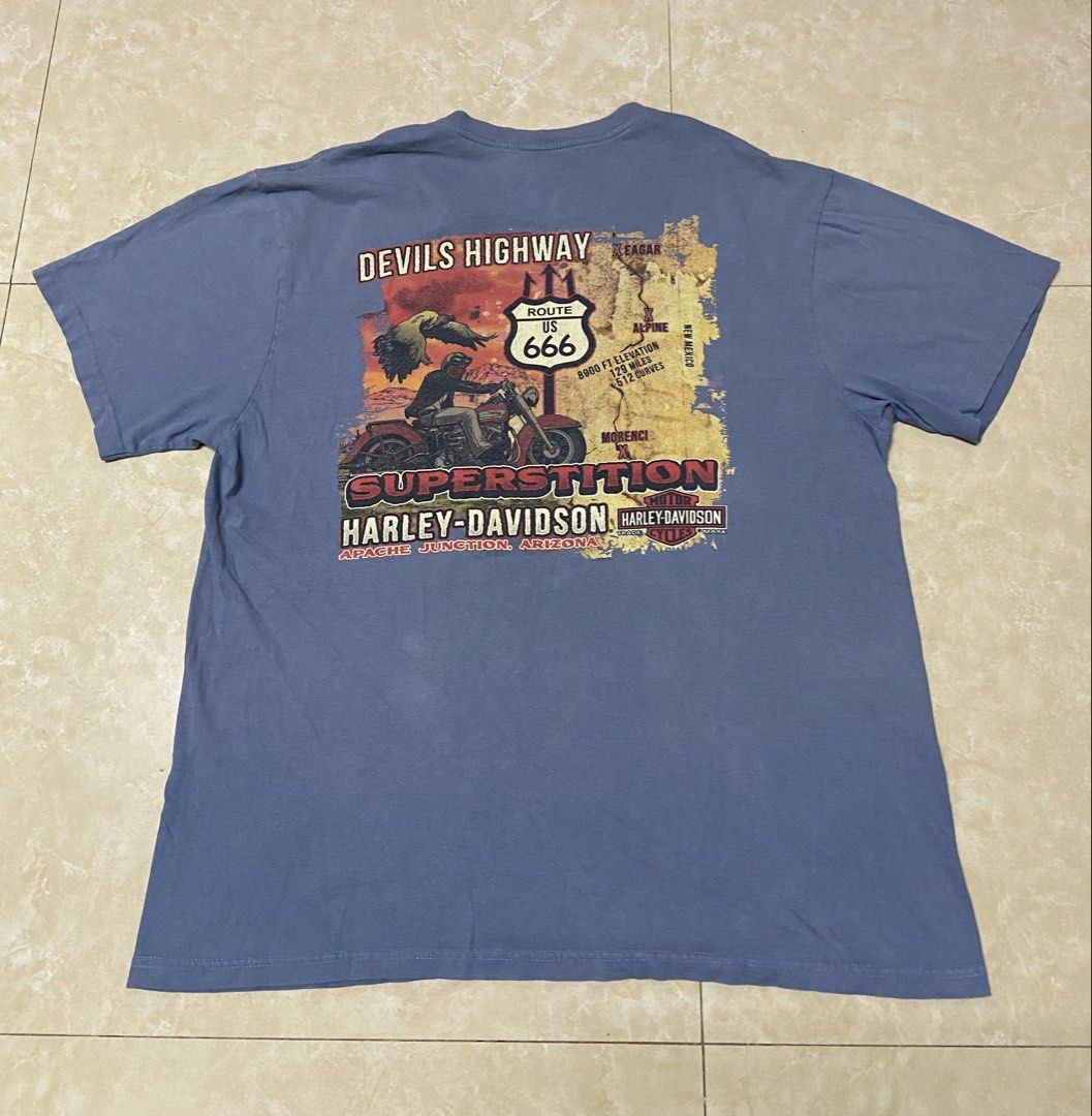 Harley-Davidson Superstition Arizona Devils Highway T-Shirt (Category: Tshirts & Polo Shirts ) located in Binan City. Submitted by doze16 (Listing ID 1470693373, Image 2). Description: - Official 2020 Harley-Davidson merchandise - Color: Muted blue wash - Front design: Bald eagle with Bar & Shield logo - Back design: Devils Highway Route US 666 Superstition Apache Junction, Arizona with map graphics.